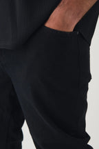 BLACK STRETCH NARROW FIT JEANS